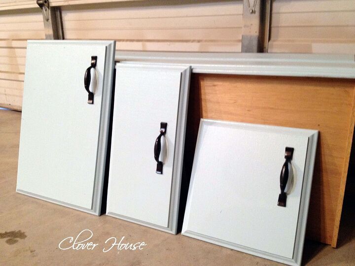 rv remodel on a budget camper cabinet update for 0, kitchen cabinets, Freshly painted cabinet doors with new handles