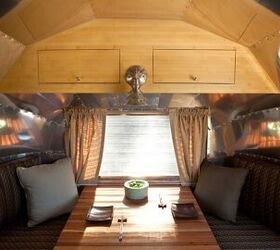 beautiful and green runaround sue 1961 vintage airstream safari renovation, Dining area of renovated vintage Airstream The tabletop folds down to form a bed