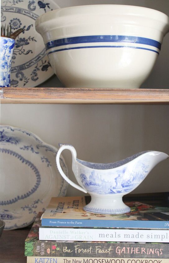 top 5 items to look for when thrifting, thrifted blue and white ironstone and stoneware in hutch
