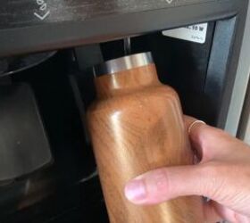 10 easy ways to reduce waste save money in the process, Filling up a reusable water bottle