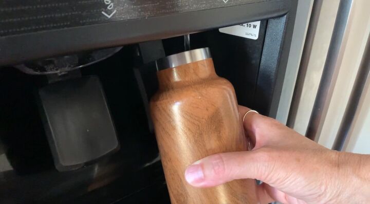 10 easy ways to reduce waste save money in the process, Filling up a reusable water bottle