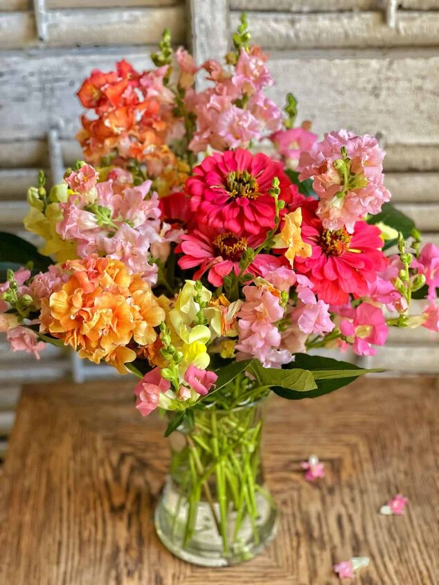 5 simple tips to thrift like a boss for the garden, Cut flowers from my garden in a glass vase on a thrift store end table with vintage shutters