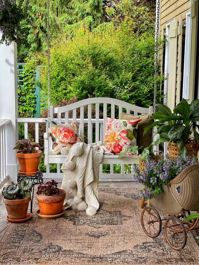 5 simple tips to thrift like a boss for the garden, Front porch decor for summer with vintage baby carriage filled with scaevola flowers