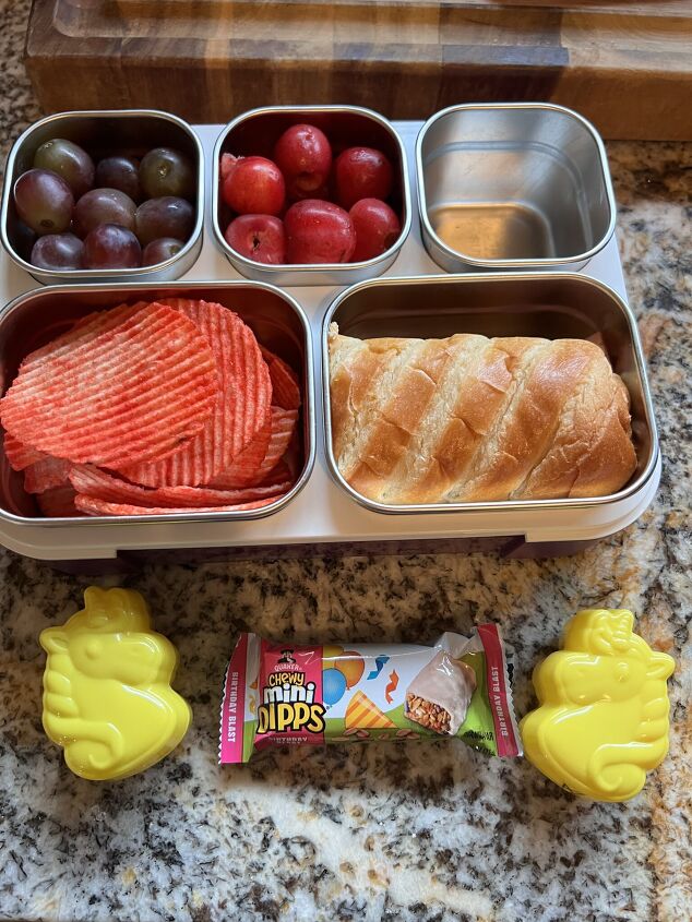 budget friendly fast back to school lunch ideas, Ham on mini brioche grapes cherries chips granola bar hidden in surprise unicorn eggs