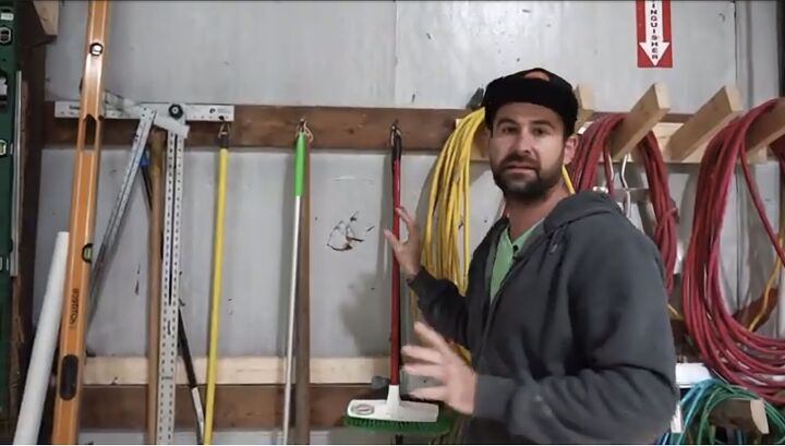 how to organize a workshop 8 simple efficient storage ideas, Hanging brooms on the wall