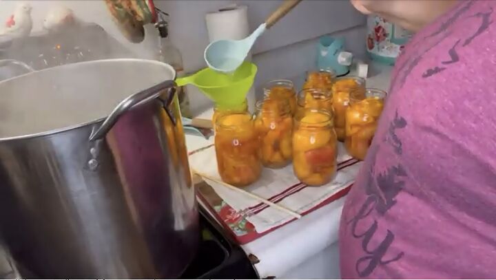 want to save the summer s peaches try this easy peach canning recipe, Adding syrup to the canned peaches