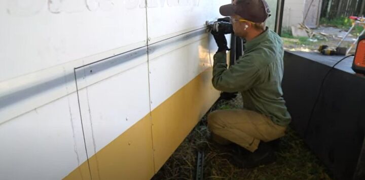 how to install under bus storage boxes on a school bus conversion, Cutting the hole in the side of the bus