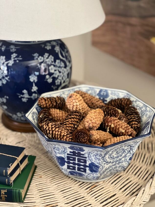 natural and simple decorating ideas for fall, Pine cones in blue bowl for Fall decor