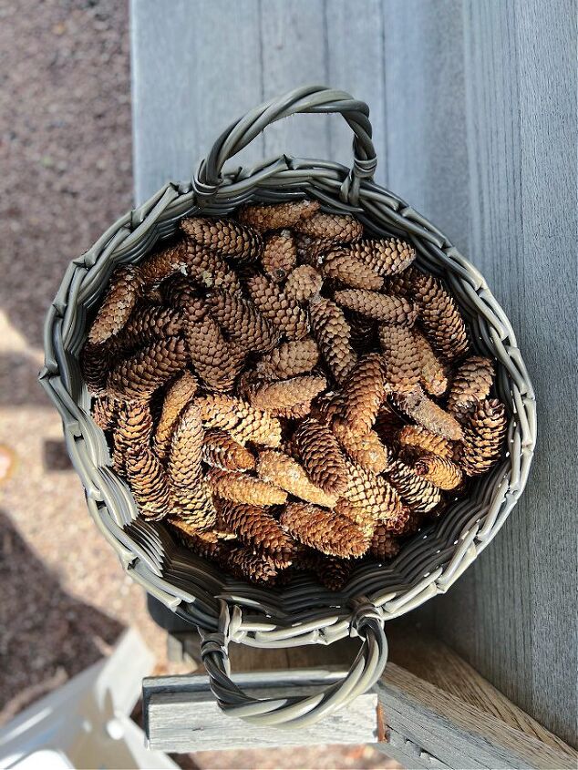 how to prepare pine cones for crafts or decor, Large basket of pine cones for cost effective Fall decor