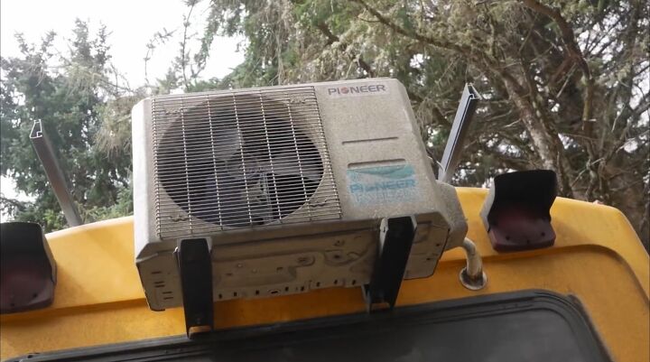 7 skoolie building regrets things to know before a diy conversion, Mini split air conditioner on the back of the skoolie