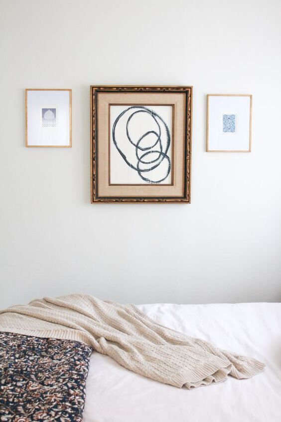 4 diy home decor projects you can do in one day, Vintage frame with abstract art hanging in the middle of two smaller gold framed pictures