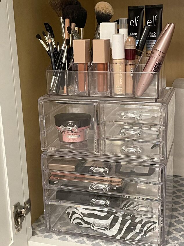 15 awesome storage solutions for your bathroom, Clear acrylic storage organizers hold make up in the bathroom
