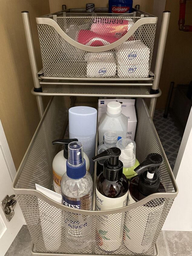 15 awesome storage solutions for your bathroom, Pull out drawers storing products in a bathroom cabinet