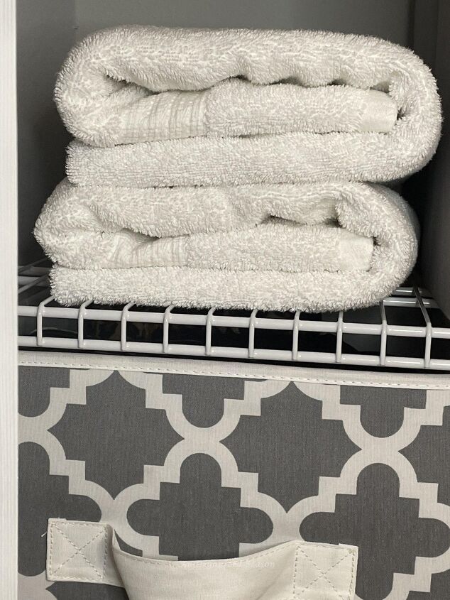 15 awesome storage solutions for your bathroom, White towels folded neatly in a closet
