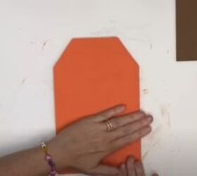 how to use dollar tree faux leather items in diy fall decor, Applying paper to the shape
