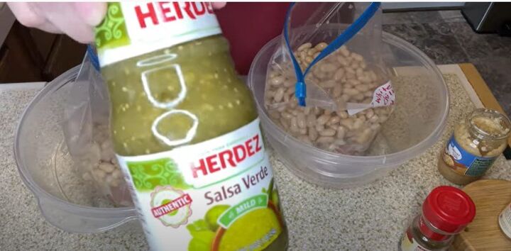 4 easy freezer meal prep ideas for quick simple dinners, Adding salsa to the freezer bags