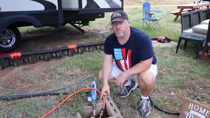 8 rv campsite setup ideas to help you avoid common setup mistakes, Hooking up the water to the RV
