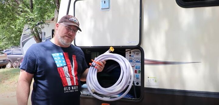 8 rv campsite setup ideas to help you avoid common setup mistakes, Hooking up the water hoses