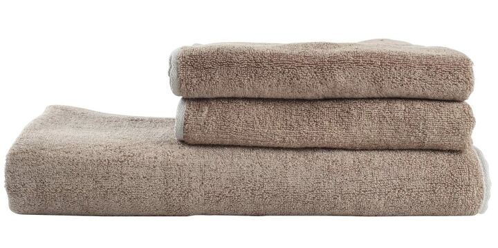 zero waste bathroom tips, Stack of brown bamboo towels