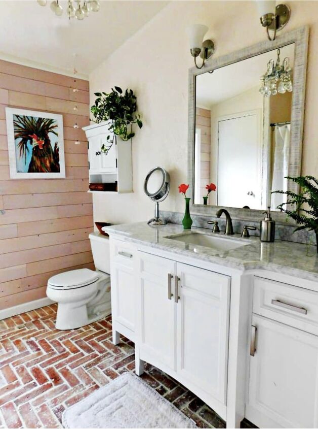 8 tips for your next bathroom renovation, Bright bathroom with brick floor and wood panel wall