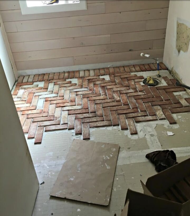 8 tips for your next bathroom renovation, Brick in process of being installed on bathroom floor