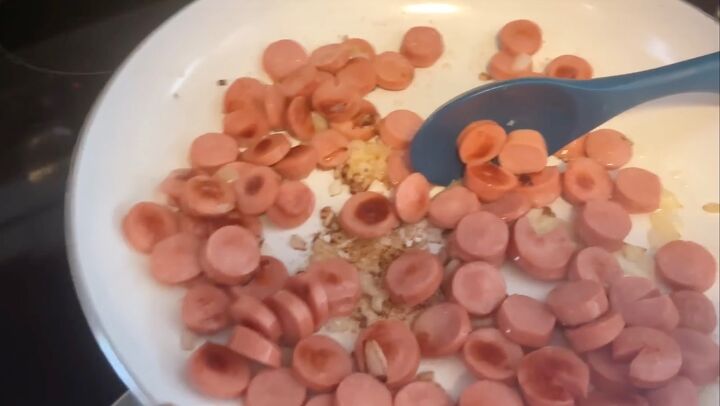 how to make 25 family friendly extreme budget meals for 40, Sauteing the hot dogs and onion