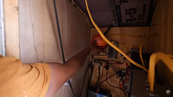 take a tour of our diy skoolie build for our young family of 4, Electrical closet in a skoolie