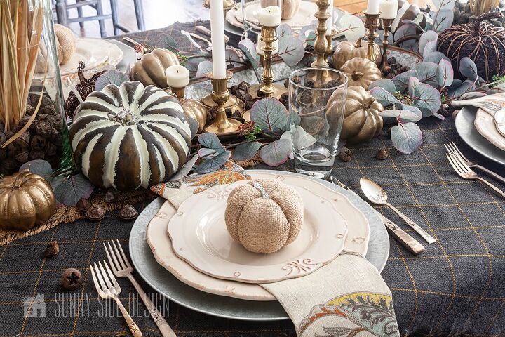 6 easy tips for creating a rustic thanksgiving table, Rustic yet elegant Thanksgiving table setting Grey and mustard table scarf topped with a mix of rustic pumpkins Thrifted brass candlesticks with white candles Galvanized chargers with off white dishes paisley napkins and a burlap pumpkin