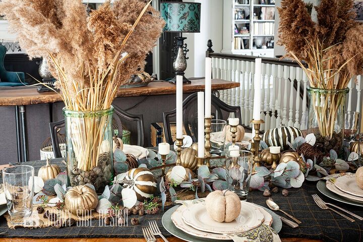 6 easy tips for creating a rustic thanksgiving table, Natural Elements of pampas grass in large glass vases thrifted brass candles sticks and a mix of pumpkins create a rustic yet elegant Thanksgiving table