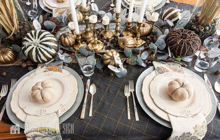 6 easy tips for creating a rustic thanksgiving table, Grey and mustard table scarf topped with a mix of rustic pumpkins Thrifted brass candlesticks with white candles Galvanized chargers with off white dishes paisley napkins and a burlap pumpkin