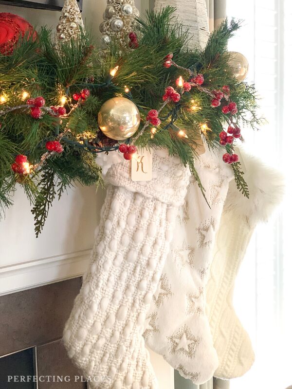 tips for packing away your christmas decorations, Christmas Stockings on Mantel