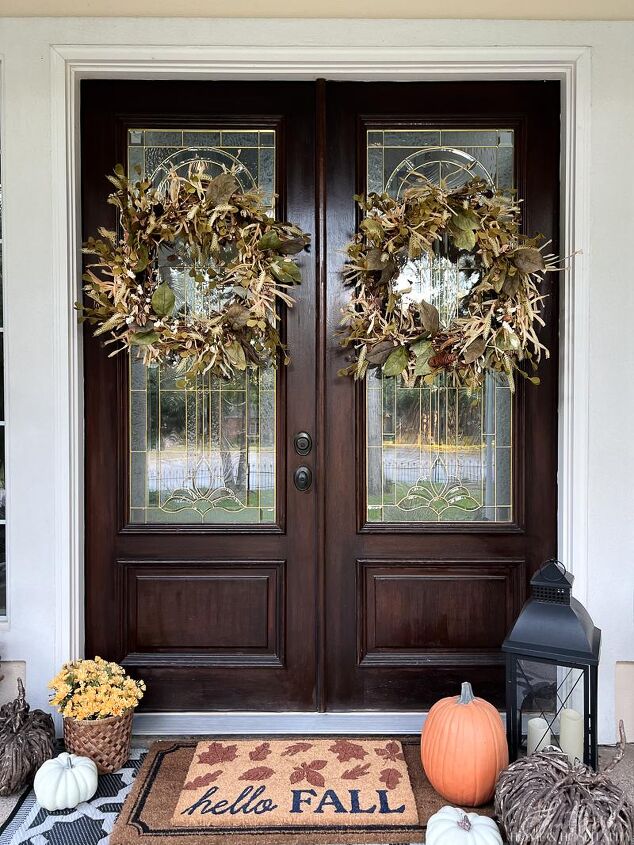 easy fall front porch ideas that won t break the bank, Front doors with fall wreaths and fall doormat