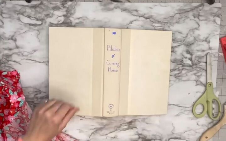 6 cute diy book decor ideas using books from dollar tree, Opening the book with the pages down