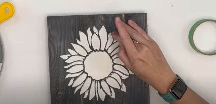 4 creative ways to use dollar tree caulk to make decor, Sunflower stencil