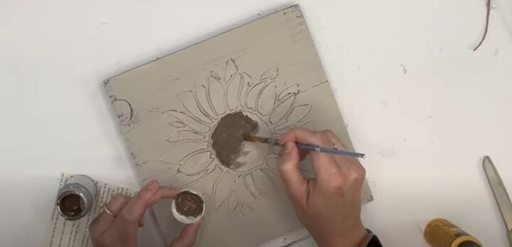 4 creative ways to use dollar tree caulk to make decor, Painting the inside of the sunflower