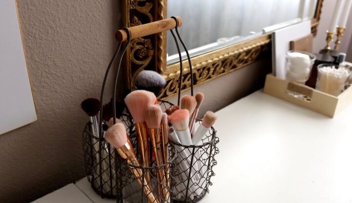 12 practical beautiful clever organizing solutions for your home, Using a thrifted vessel to store makeup brushes
