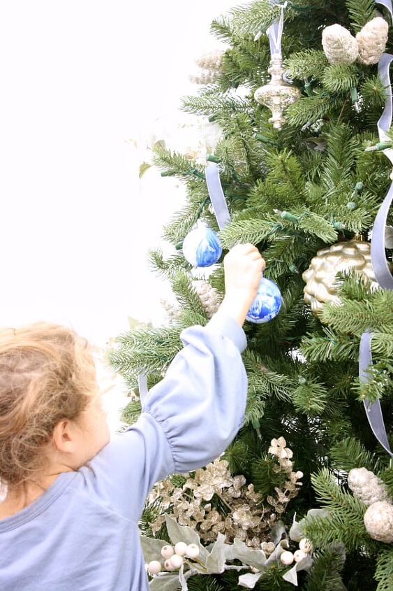 10 beautiful christmas decorating ideas on a budget, Come see how we added touches of blue to our Christmas tree