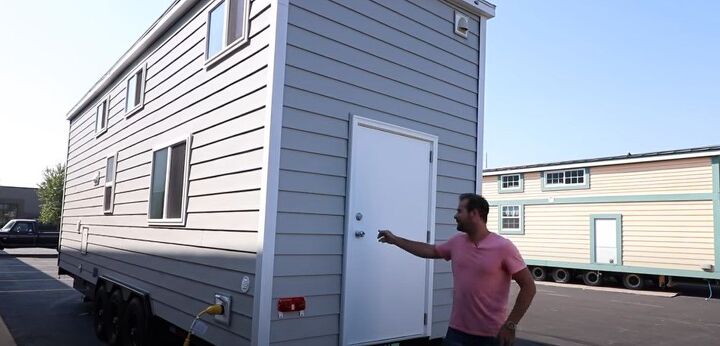 take a tour of this tiny house designed for homestead living, Door to the storage room