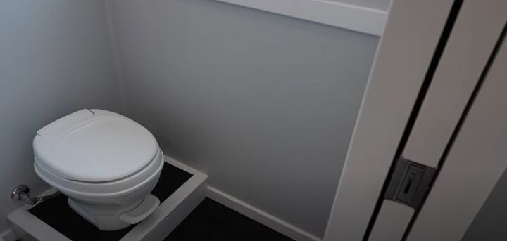 take a tour of this tiny house designed for homestead living, Tiny home toilet