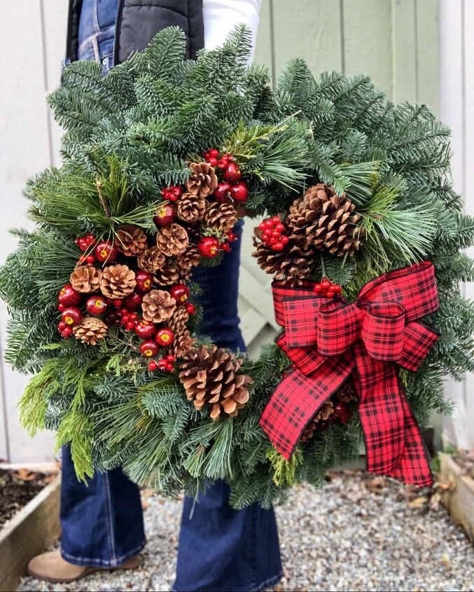 winter gardening with outdoor planters for the front porch, Christmas Wreath Ideas close up of farmhouse christmas wreath with red plaid bow and pine cones