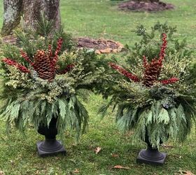 winter gardening with outdoor planters for the front porch, To add that wow factor tucked in oversized pine cones and beautiful faux berries with fresh cut winter greens in black urns for the front porch Decorating the Front Porch for Christmas