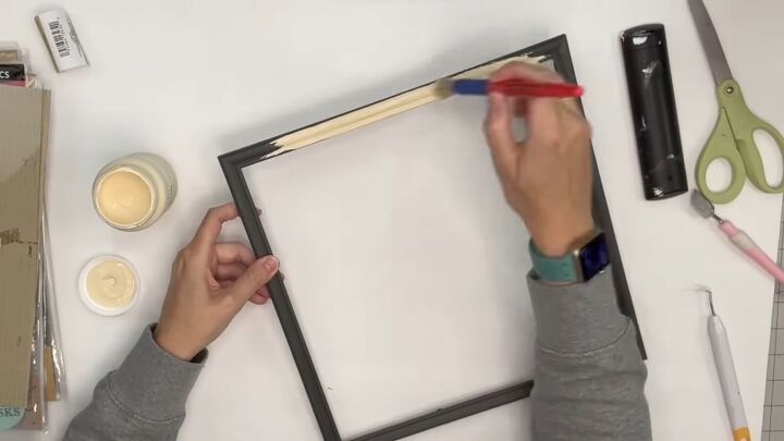 7 crafty ways to use dollar tree fabric this fall, Painting a picture frame