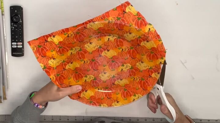7 crafty ways to use dollar tree fabric this fall, Covering the plate with fabric and Mod Podge