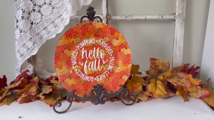 7 crafty ways to use dollar tree fabric this fall, Adding a fall decal to the plate DIY