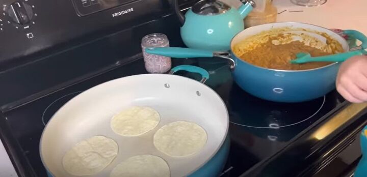 8 budget kid friendly meal mini tacos with ground turkey, Adding tortillas to the pan