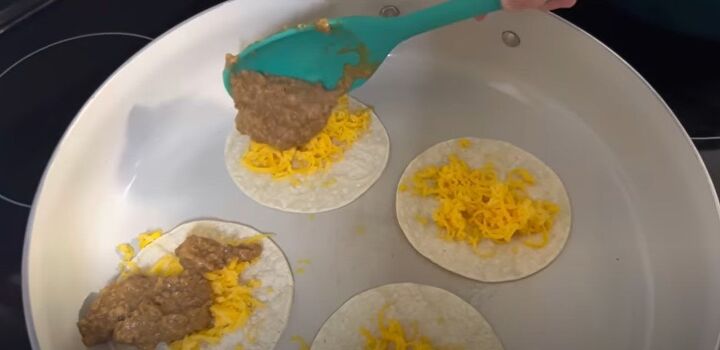 8 budget kid friendly meal mini tacos with ground turkey, Adding the meat mixture on top of the cheese