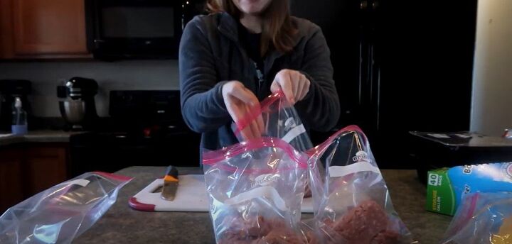 tips for freezing meat how to bulk buy package meat in the freezer, Adding raw meat to the bag