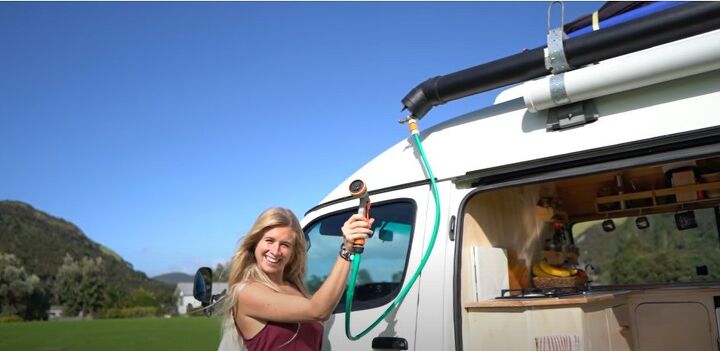 take a tour inside our diy toyota hiace camper van, Solar shower in the camper