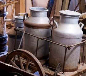 30 best frugal living tips from the great depression to use today, Traditional milk churns from an old fashioned frugal living time
