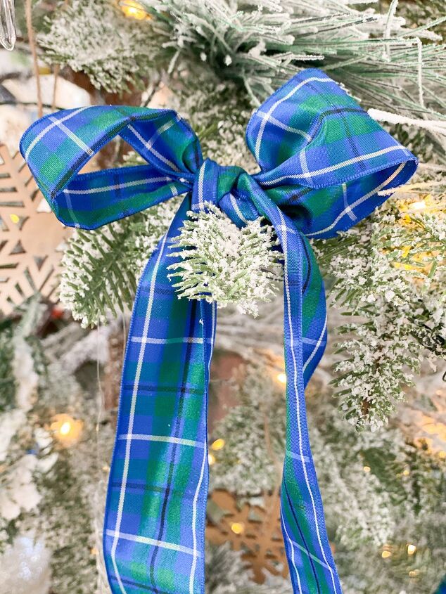 5 ways to celebrate christmas on a budget, Tartan plaid ribbon used on the Christmas tree for a budget friendly decor